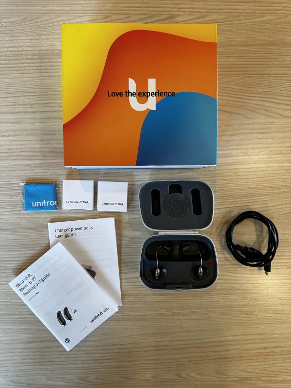used unitron hearing aids gently used hearing aids with cleaning supplies, charger, and more