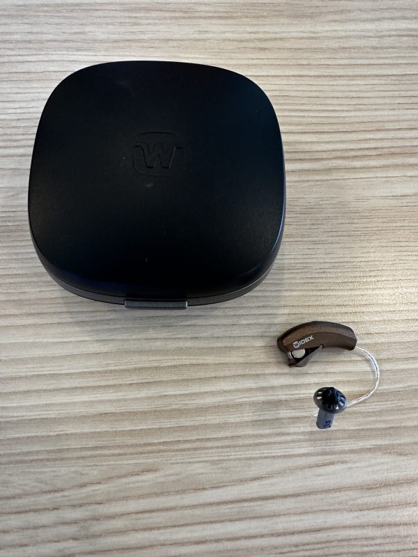 Used Widex Moment 440 RIC 10 hearing aid and carrying case
