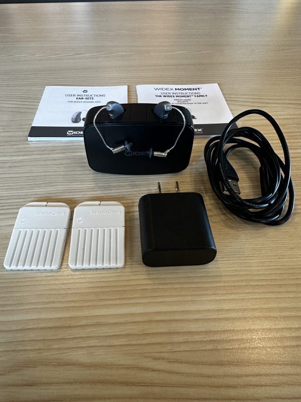 used widex moment 440 r rechargeable hearing aids with manuals, charger, and more