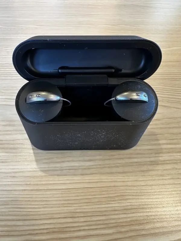used starkey genesis hearing aid and cros in starkey charger