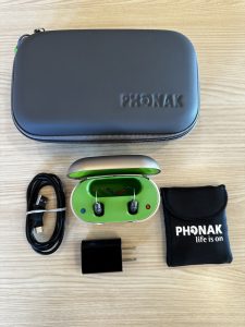 Used Phonak Audeo Lumity hearing aids with charger, case, and more