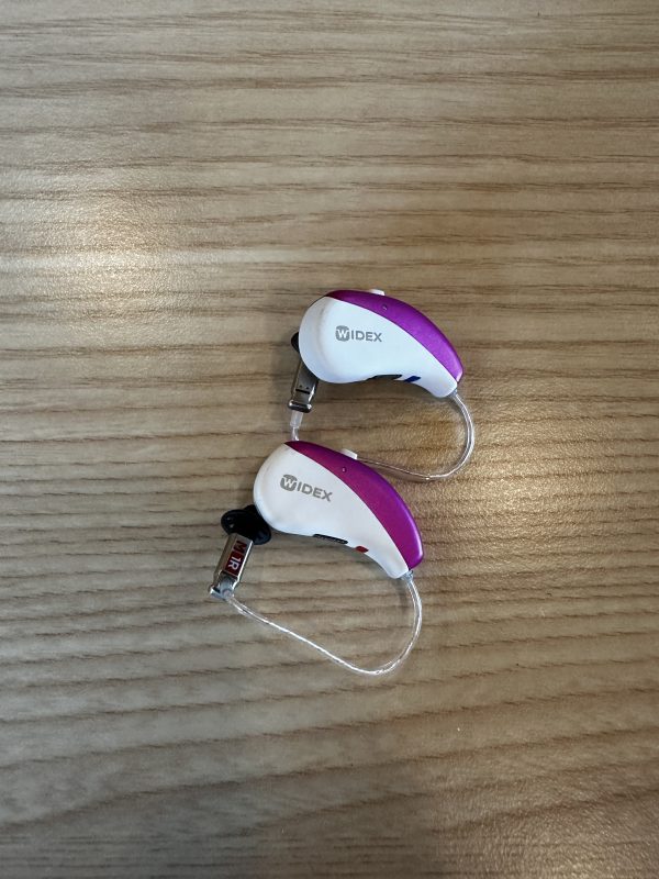 used widex moment 220 hearing aids pair in shocking pink