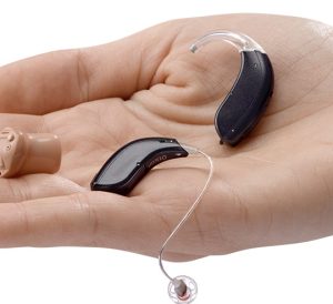 hearing aids for sale hand holding hearing aid options