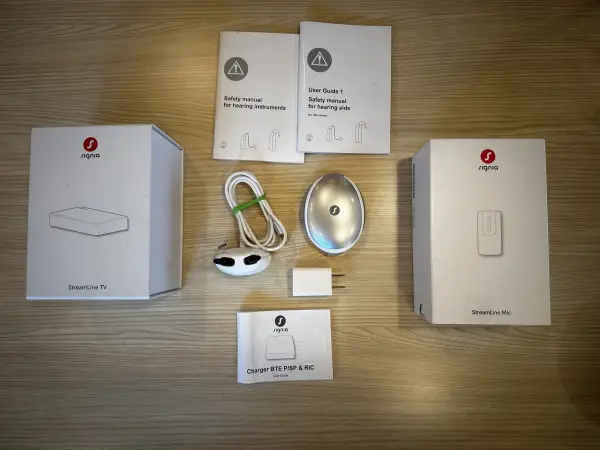 used signia pure charge&go 5ax hearing aids with accessories