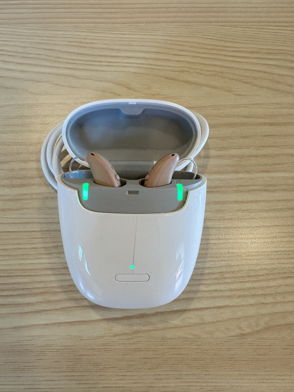 used signia 7ix hearing aids in beige in charger