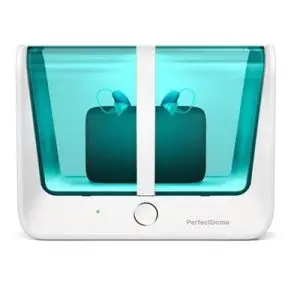 perfecrdome dehumidifier with hearing aids in charger inside